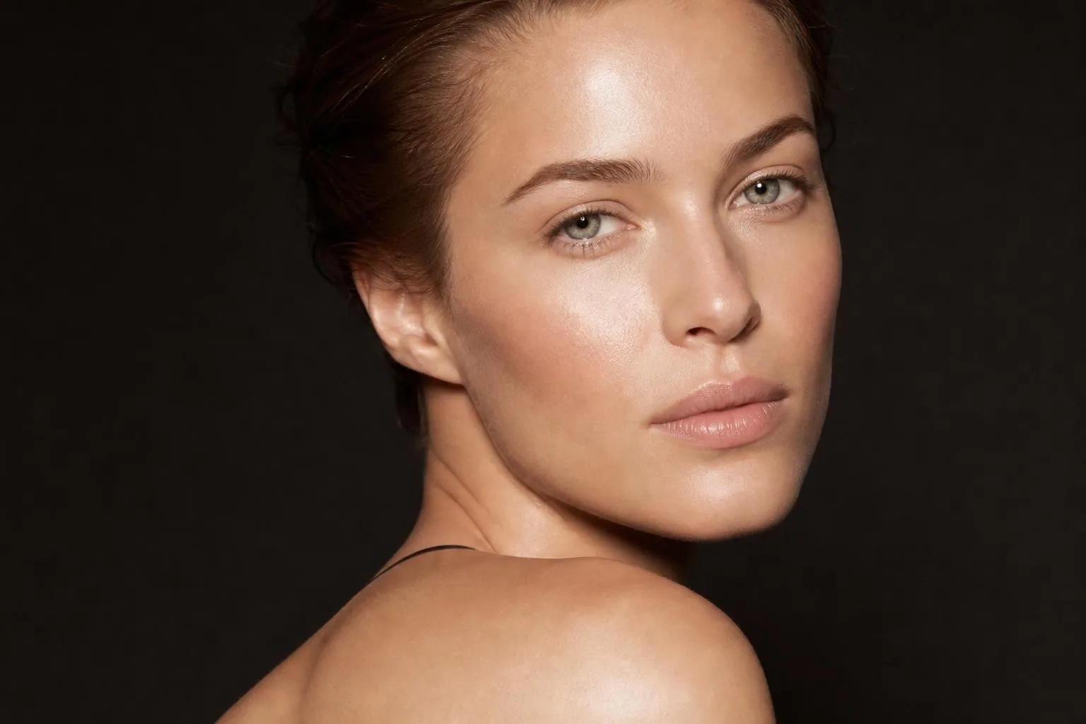 Model with flawless skin — Treasury Aesthetics treatment menu, Toronto